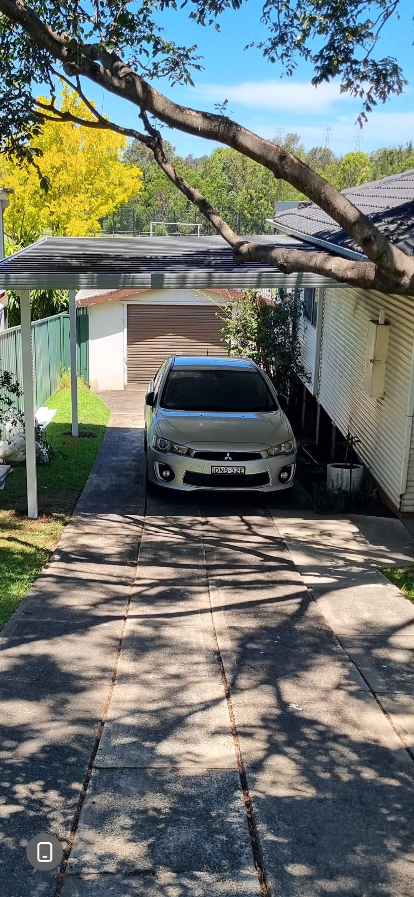 Single carport over a driveway
