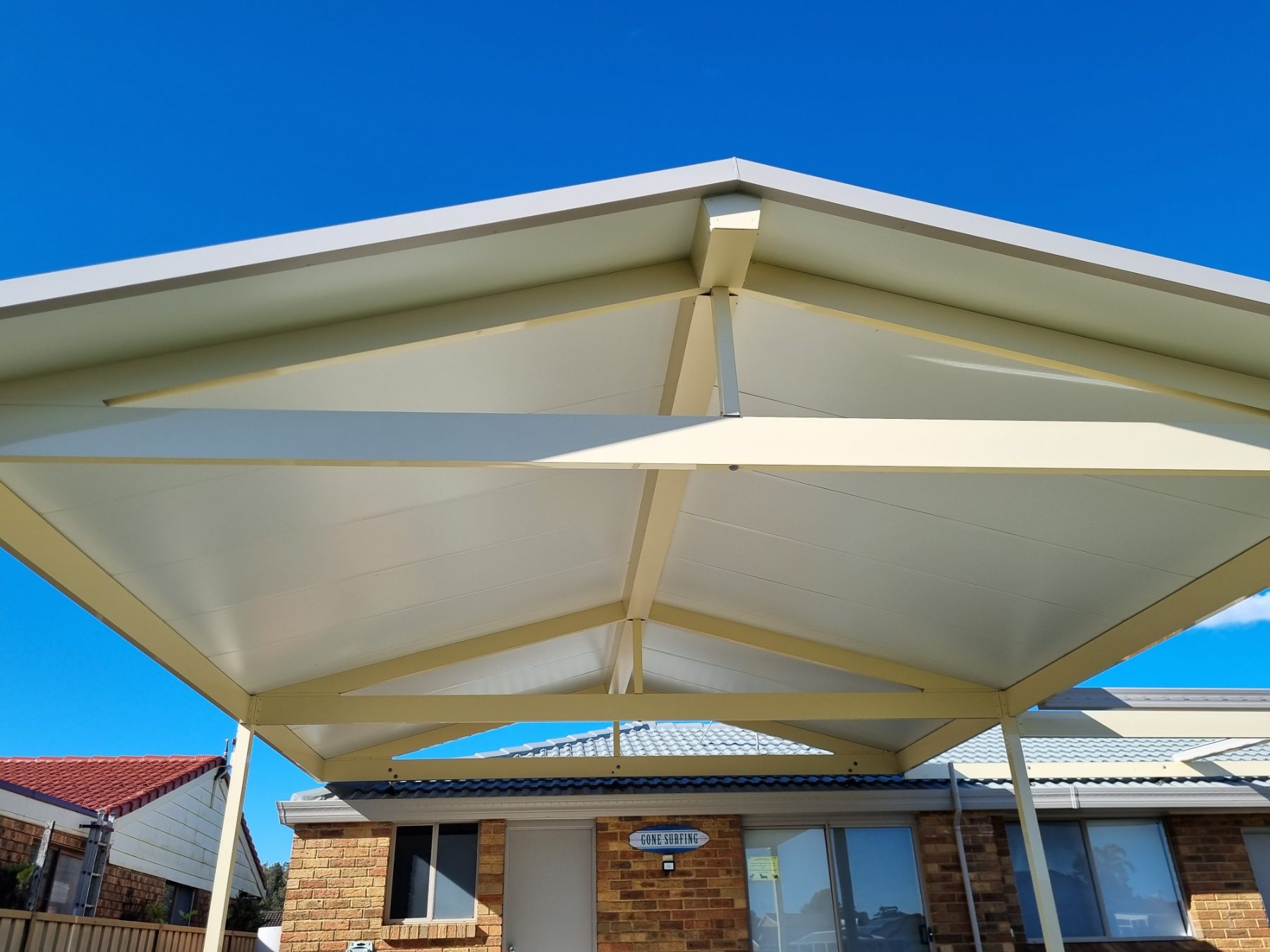 Gable roof pergola with white frame